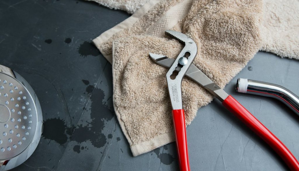 Plumbing hand tools used for bathroom fixture repair